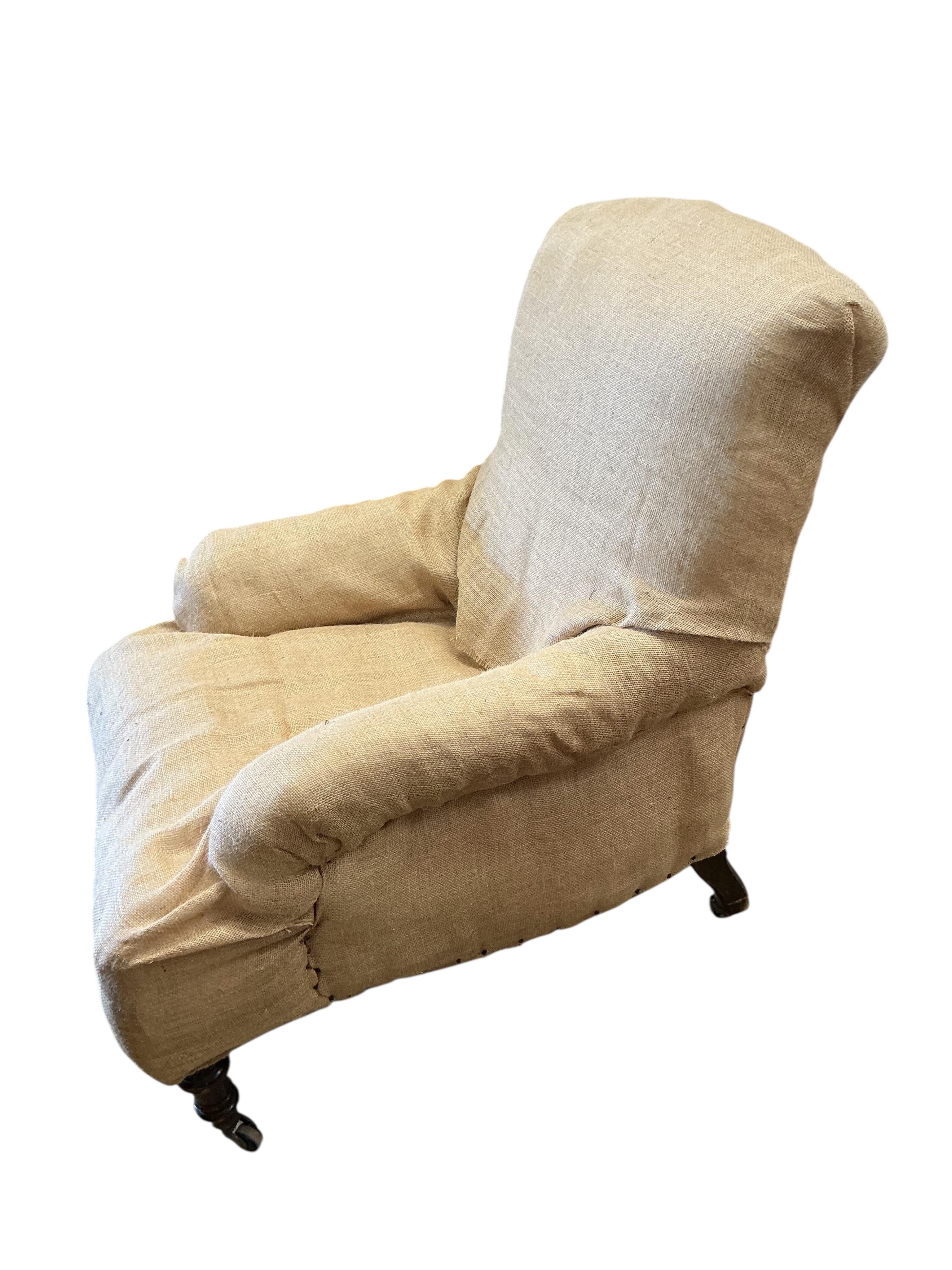 A Victorian Maple & Co. hessian covered library chair, width 72cm, depth 80cm, height 92cm